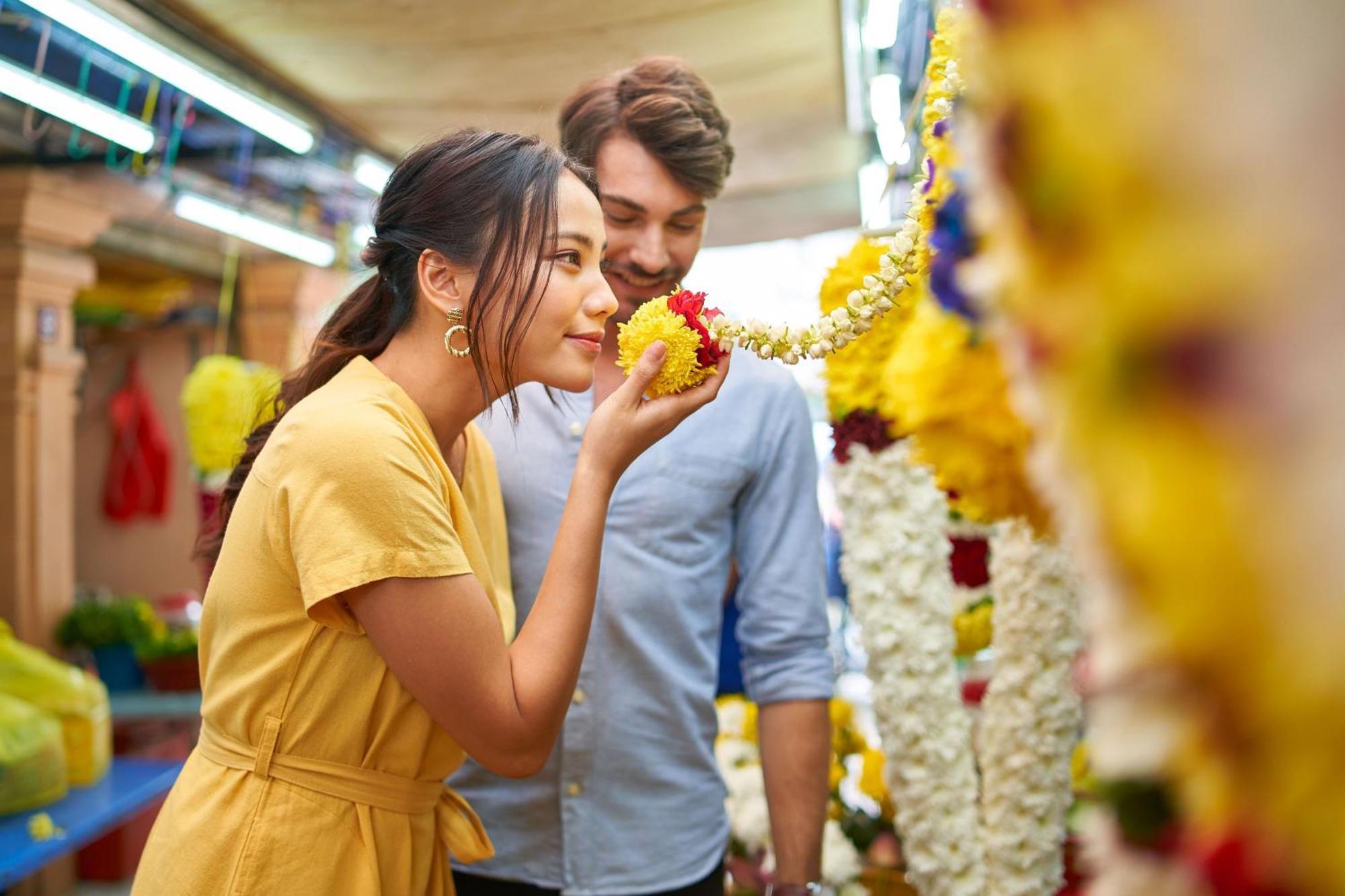 Le Meridien Kuala Lumpur Exterior photo A woman smelling flowers
